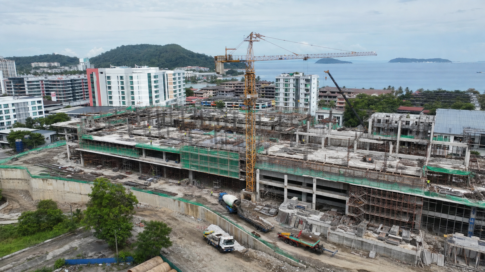 Commercial development pipeline in a Sabah coastal urban context.